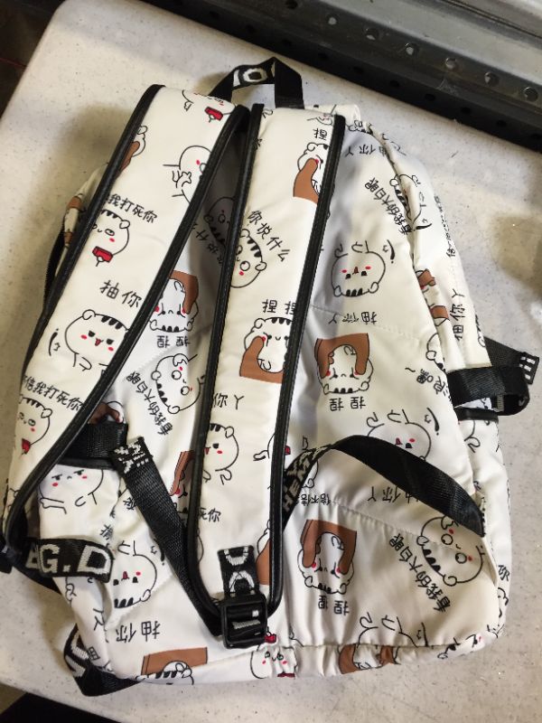 Photo 2 of backpack color white with japanese anime design 