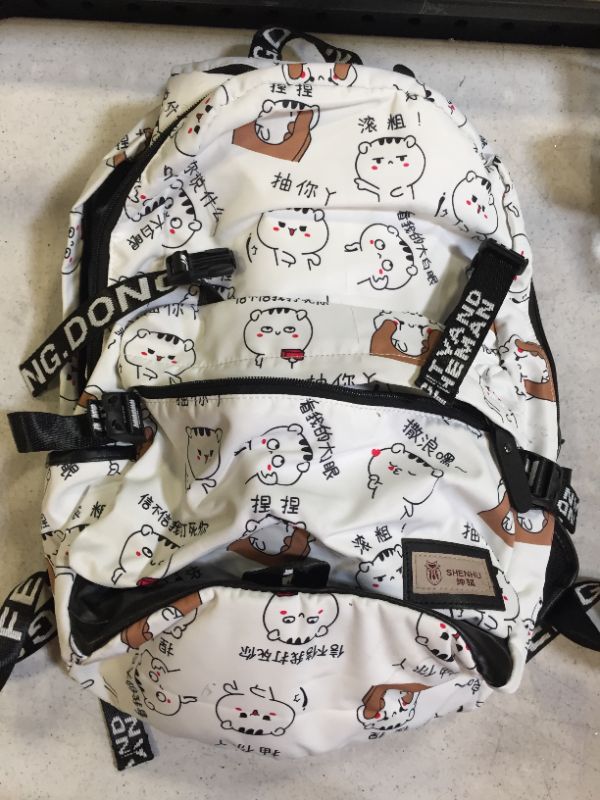 Photo 1 of backpack color white with japanese anime design 