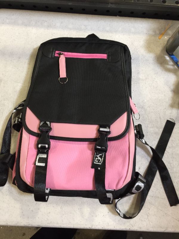 Photo 1 of backpack color black and pink 