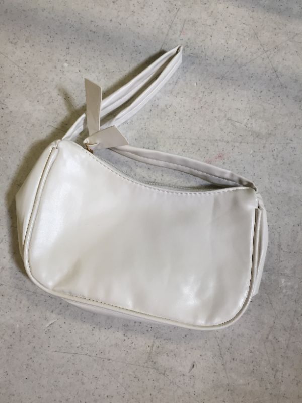 Photo 1 of fake leather purse color white size 10 inches wide 