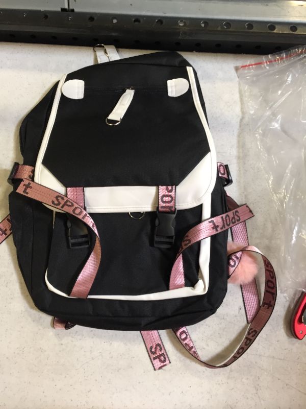 Photo 1 of backpack color black pink and white 