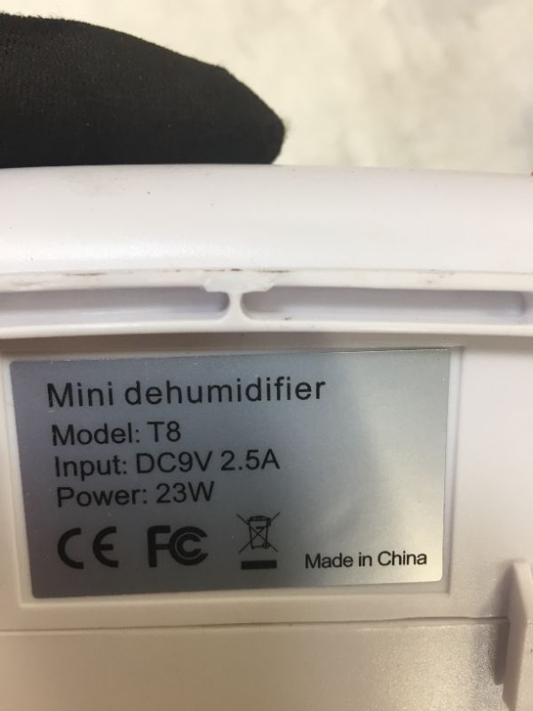 Photo 1 of mini dehumidifier color white  