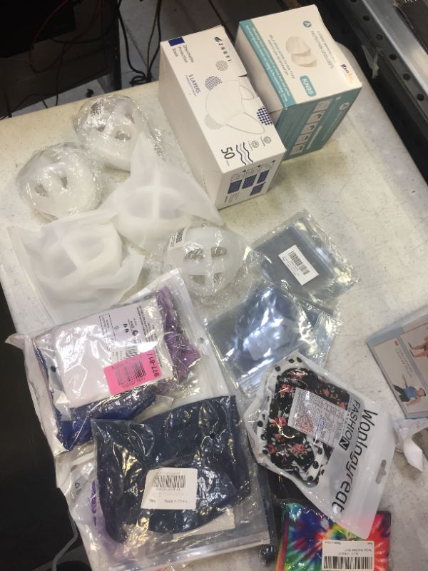 Photo 1 of  SARS-CoV-2 starter pack which includes cdc vaccine card protectors with facemasks and face gaiter also includes disposal masks with plastic filter 