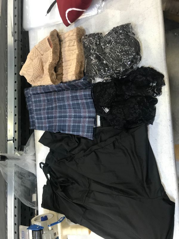 Photo 1 of bundle of clothes 