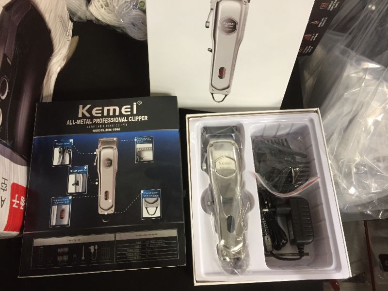 Photo 2 of Kemei KM-1998 4x1 Rechargeable Multi Function Shaver