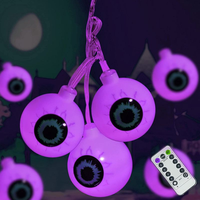 Photo 1 of Halloween Eyeball Decoration String Lights 30LED Outdoor and Indoor with Remote Control Waterproof Battery Operated,Haunted Houses Window Tree Party to Create a Halloween Horror Atmosphere (Purple)