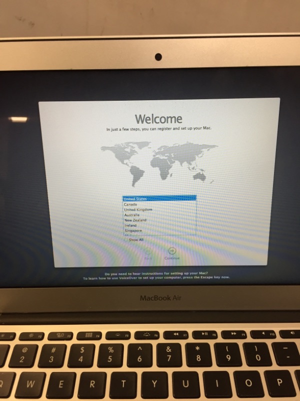 Photo 1 of MACBOOK AIR MODEL A1465 (MISSING CHARGER, MINOR SCARTCHES ON ITEM)