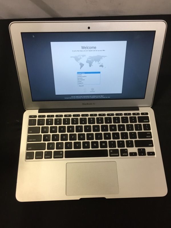 Photo 1 of MACBOOK AIR MODEL A1465 (MISSING CHARGER, MINOR SCARTCHES ON ITEM)