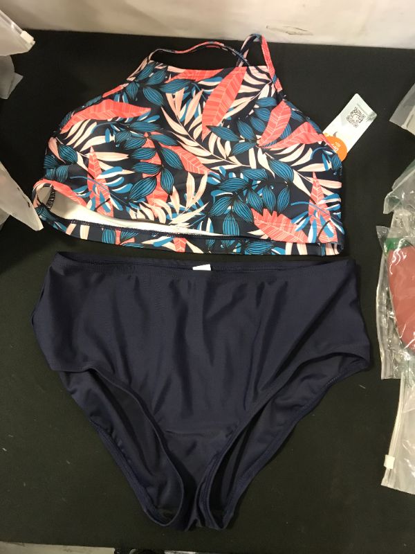 Photo 1 of bathing suit floral top with navy bottoms