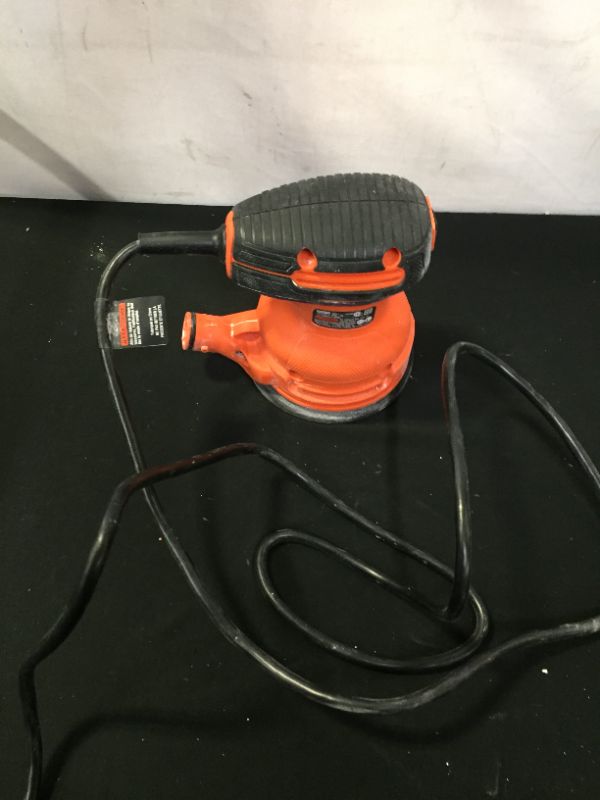 Photo 2 of 
BLACK+DECKER Random Orbit Sander, BDER0100 (MISISNG PIECE TO ITEM, MAJOR PAINT STAINS ON ITEM INDICATE MAJOR USE)