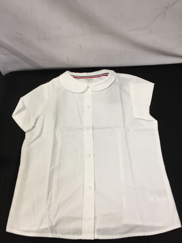 Photo 1 of GIRLS BUTTON UP SIZE 10 (MAJOR DMAGES TO PACKAGING)