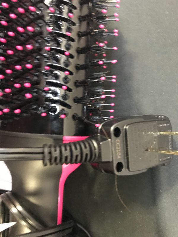 Photo 1 of REVLON One-Step Hair Dryer And Volumizer Hot Air Brush, Black, Packaging May Vary
