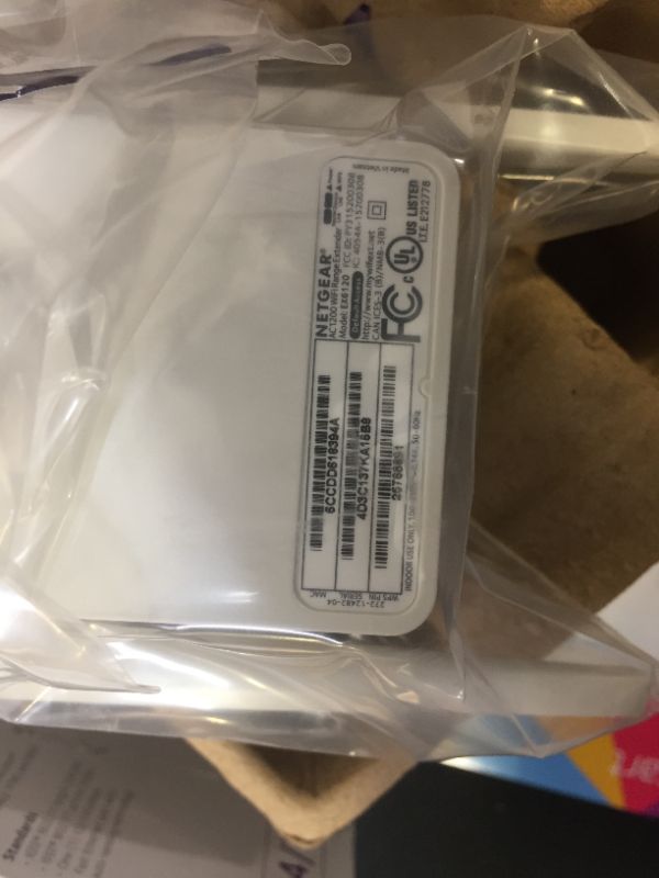 Photo 2 of NETGEAR Wi-Fi Range Extender EX6120 - Coverage Up to 1500 Sq Ft and 25 Devices with AC1200 Dual Band Wireless Signal Booster & Repeater (Up to 1200Mbps Speed), and Compact Wall Plug Design
