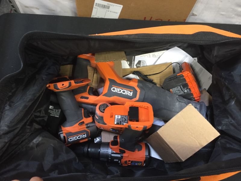 Photo 3 of 18V Brushless Cordless 4-Tool Combo Kit with (1) 4.0 Ah and (1) 2.0 Ah MAX Output Batteries, 18V Charger, and Tool Bag
