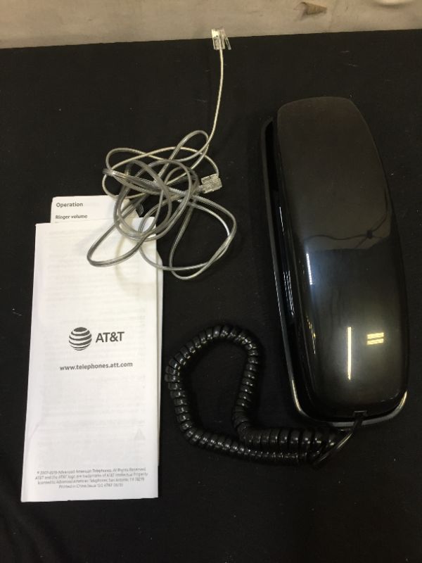 Photo 2 of AT&T 210 Basic Trimline Corded Phone, No AC Power Required, Wall-Mountable, Black
