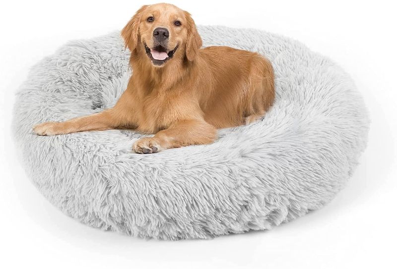 Photo 1 of Dog Bed, Cat Calming Bed, Faux Fur Pillow Pet Donut Cuddler Round Plush Bed for Large Medium Small Dogs and Cats