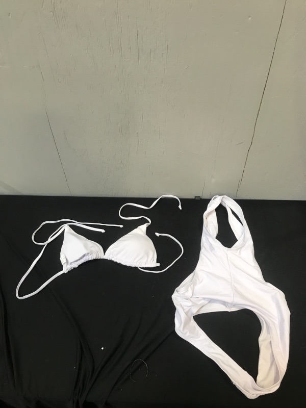 Photo 1 of Generic White Two Piece Swimsuit. Medium