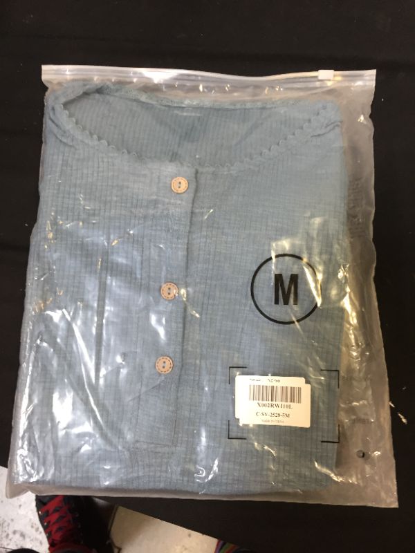 Photo 1 of generic medium blue top 