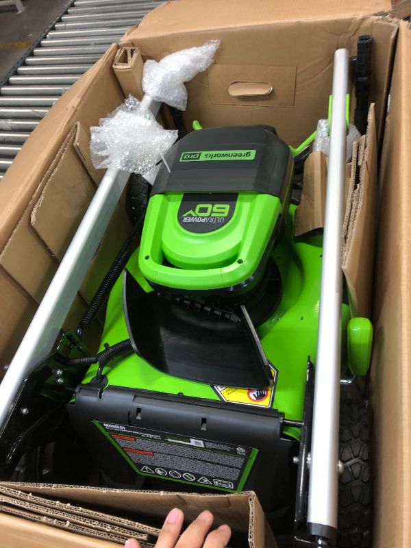 Photo 2 of Greenworks Pro 60V Self Propelled Cordless Brushless 21” Lawn Mower kit