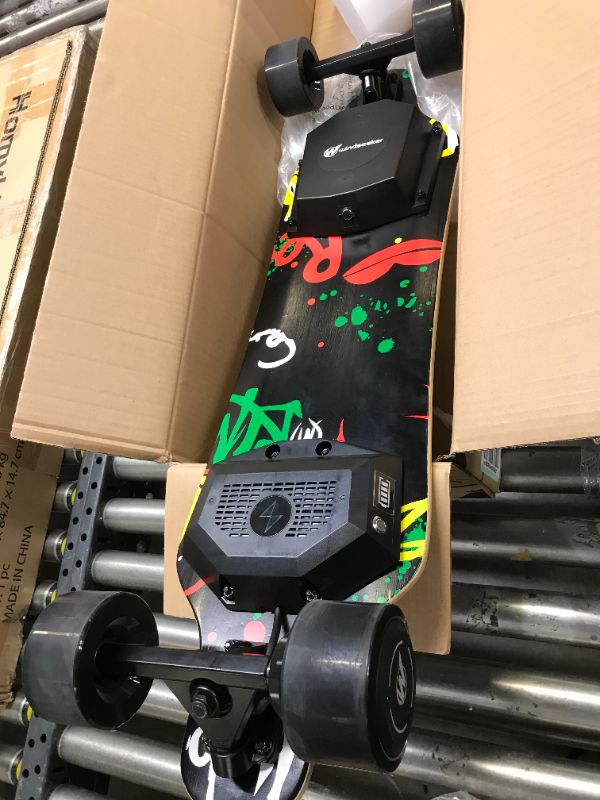 Photo 4 of Electric Skateboard, Electric Longboard with Remote for Adults and Teens, 450W Brushless Motor, 20 MPH Top Speed, 12.5 Miles Range, 5+2 Plys Maple and Bamboo, Max Load 220Lbs
