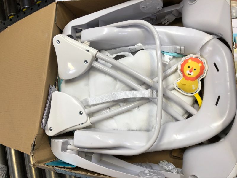 Photo 1 of Fisher-Price Deluxe Take-Along Swing  Seat - Windmill