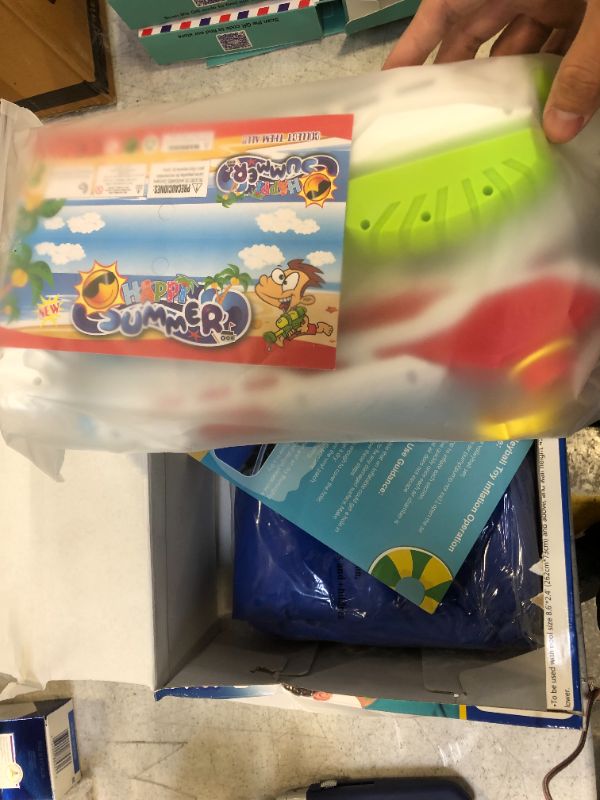 Photo 1 of Inflatable Volleyball Set With 2 Water Gun And 2 In 1 Sling Puck Game 