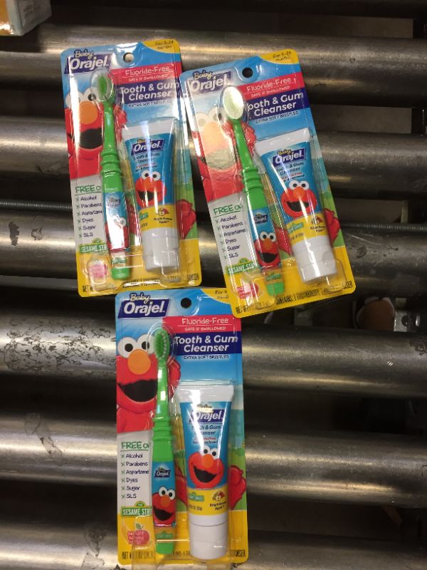 Photo 1 of Orajel Elmo Fluoride-Free Tooth & Gum Cleanser 1.0 oz. with Toothbrush, Banana Apple, 1 oz. 3 Pack 
