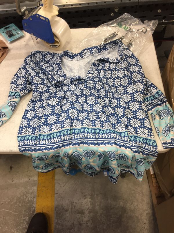 Photo 1 of Generic blue shirt, unknown size