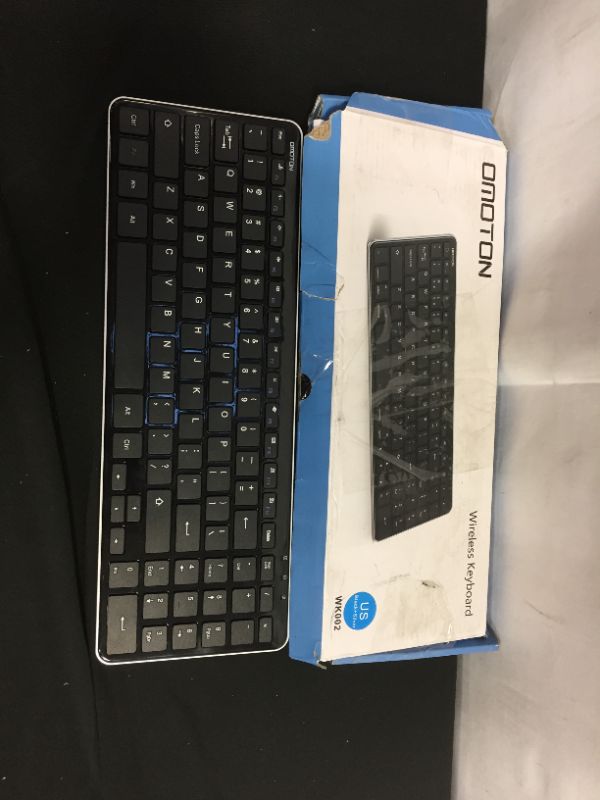 Photo 1 of omoton wireless keyboard 