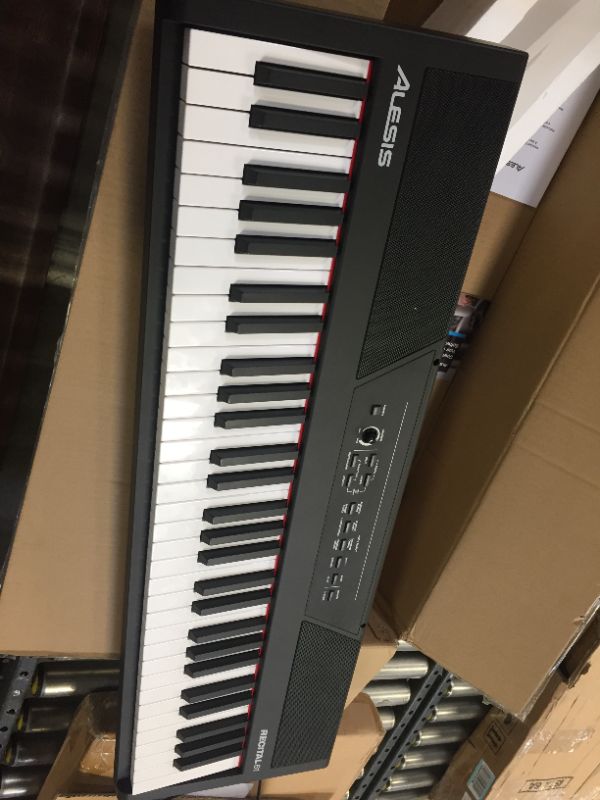 Photo 2 of Alesis Recital 61 – 61 Key Digital Piano Keyboard with Semi Weighted Keys, 20W Speakers, 10 Voices, Split, Layer and Lesson Mode, FX and Piano Lessons