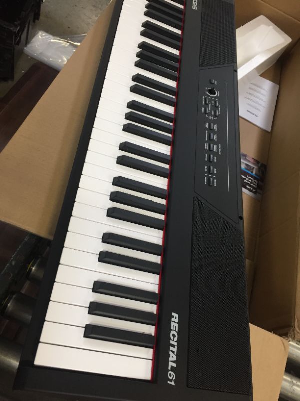 Photo 1 of Alesis Recital 61 – 61 Key Digital Piano Keyboard with Semi Weighted Keys, 20W Speakers, 10 Voices, Split, Layer and Lesson Mode, FX and Piano Lessons