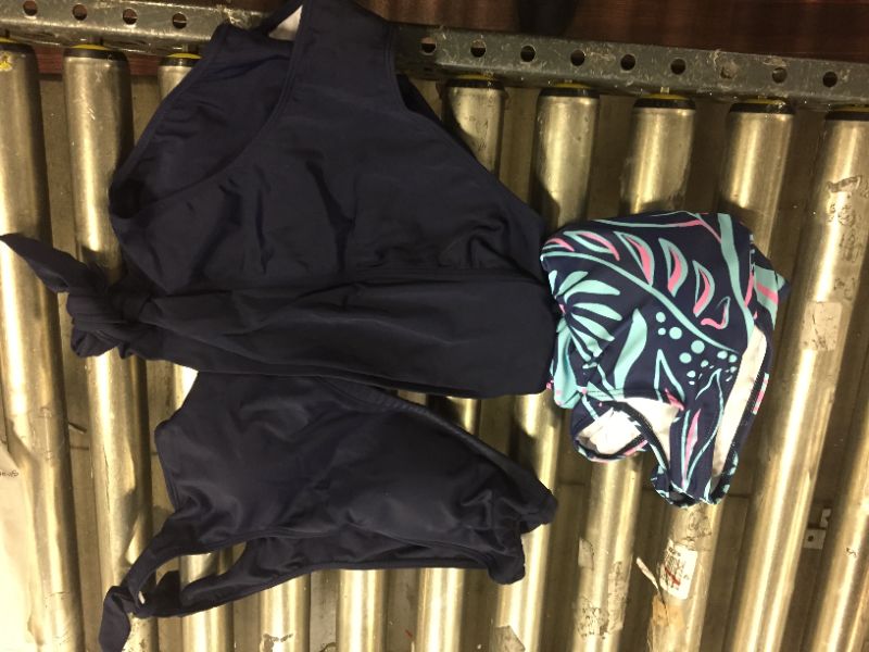 Photo 3 of 2 pack of swim suits, one women's one piece size small and women's 2 piece size medium