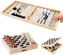 Photo 1 of AVSOG FAST SLING PUCK GAME & INTERNATIONAL CHESS 2 IN 1 TABLE DESKTOP BATTLE