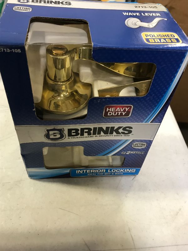 Photo 4 of Brinks 2713-105 Wave Style Lever Door Knob with Privacy Key for Bedroom and Bath, Polished Brass