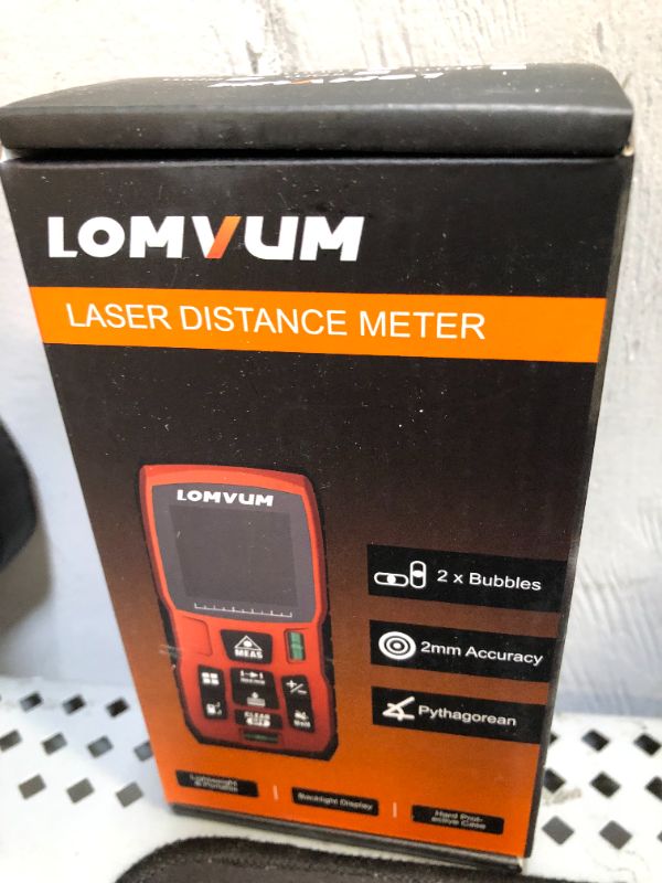 Photo 2 of Laser Measure 393Ft - LOMVUM Laser Tape Measure Laser Measurement Tool with M/in/Ft Unit Switching, Backlit LCD, Pythagorean Mode, Measure Distance, Area and Volume - Carry Pouch and Battery Included