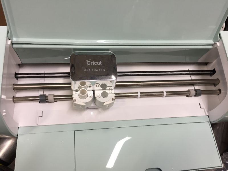 Photo 2 of Cricut Explore Air 2, Mint
- mechanism in the middle stops about 30% the length of the product as shown.