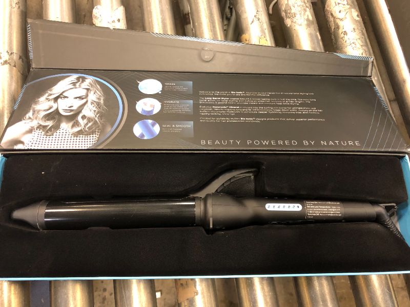 Photo 2 of Bio Ionic Long Barrel Styler Pro 1.25" Curling Iron
** HAS HAIR **