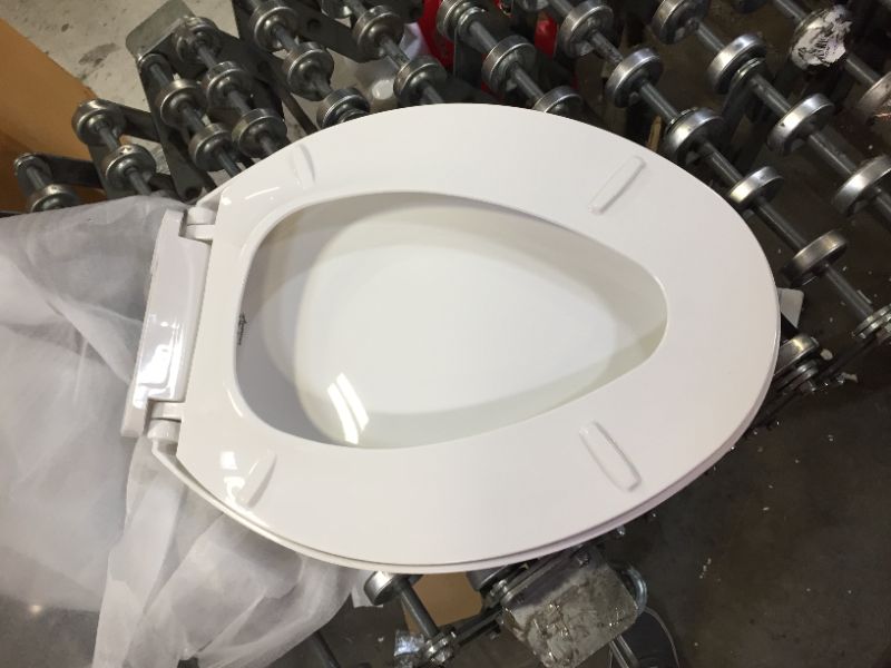 Photo 5 of American Standard Champion 4 Slow-Close Elongated Closed Front Toilet Seat in White
