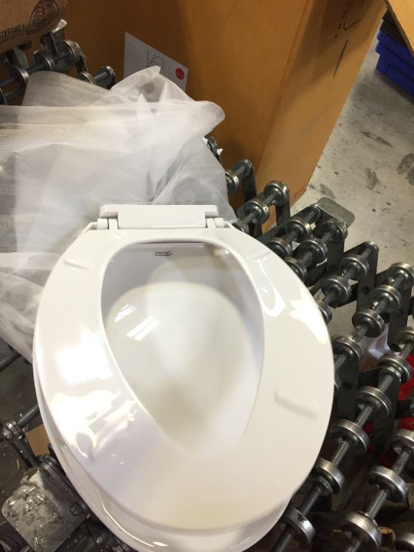 Photo 4 of American Standard Champion 4 Slow-Close Elongated Closed Front Toilet Seat in White

