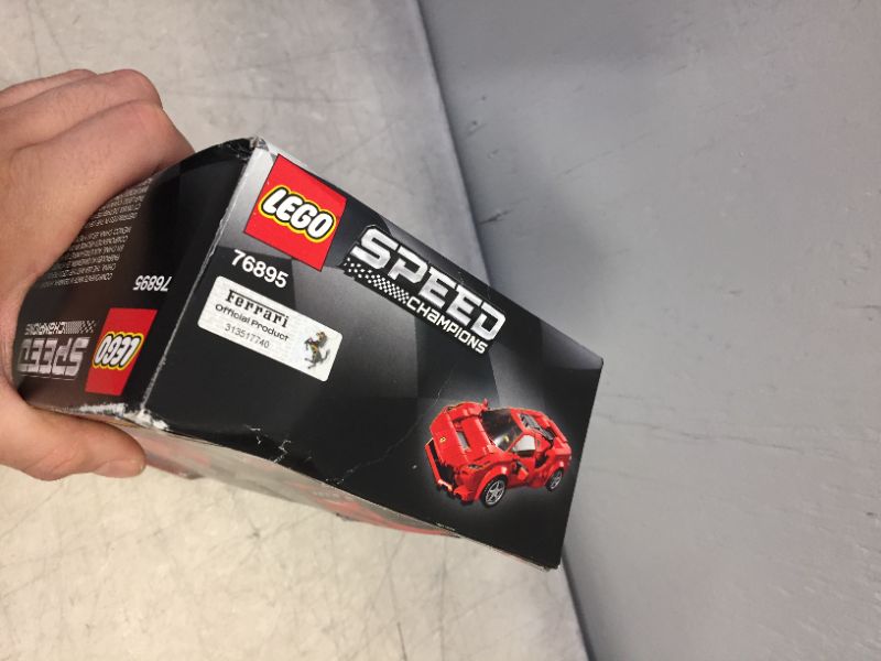 Photo 1 of LEGO Speed Champions 76895 Ferrari F8 Tributo Toy Cars for Kids, Building Kit Featuring Minifigure, New 2020 (275 Pieces) (factory sealed) (box is a bit damaged)