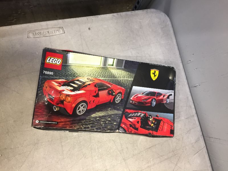 Photo 1 of LEGO Speed Champions 76895 Ferrari F8 Tributo Toy Cars for Kids, Building Kit Featuring Minifigure, New 2020 (275 Pieces) (factory sealed) (box is a bit damaged)