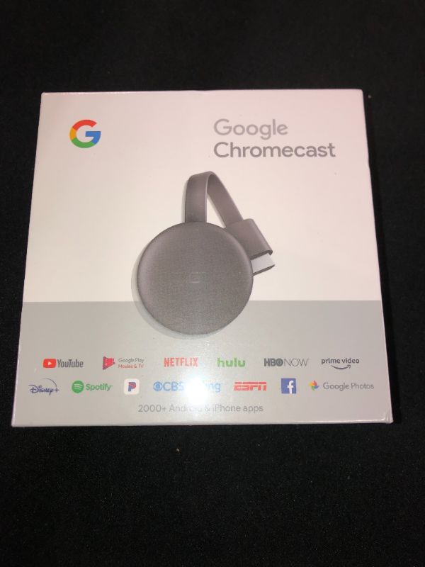 Photo 1 of Google Chromecast - Streaming Device with HDMI Cable - Stream Shows, Music, Photos, and Sports from Your Phone to Your TV
