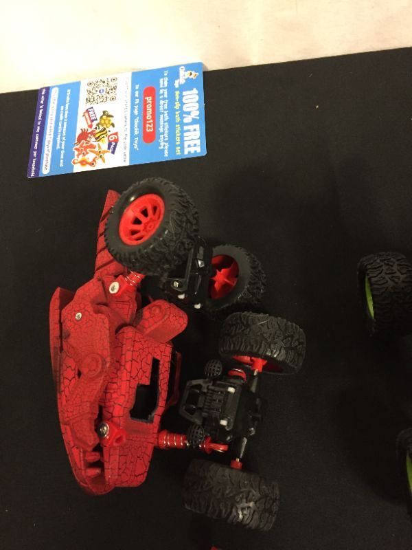 Photo 2 of kids toy (red car is damaged)