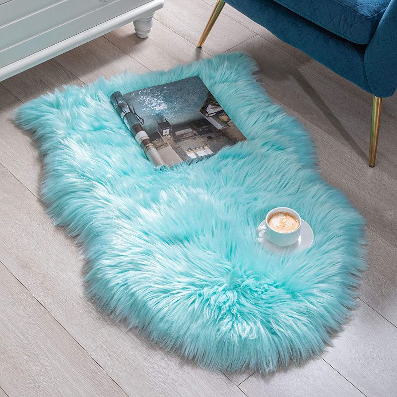 Photo 1 of BAYKA Faux Sheepskin Fur Area Rug, Luxury Fluffy Area Rug, Soft Furry Carpet Rug for Bedroom, Children’s Room, Decor Rug 2x3 Feet, Light Blue