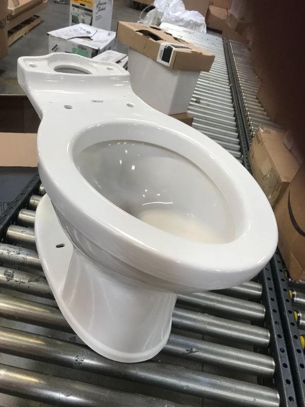 Photo 8 of Champion Tall Height 2-Piece High-Efficiency 1.28 GPF Single Flush Elongated Toilet in White Seat Included