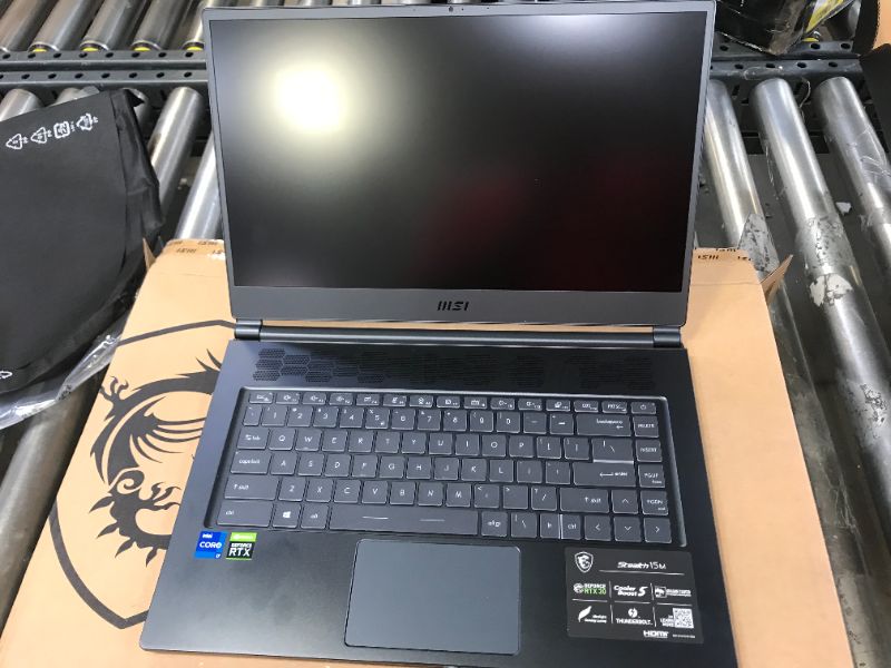 Photo 3 of MSI Stealth 15M Gaming Laptop: 15.6" 144Hz FHD 1080p Display, Intel Core i7-11375H, NVIDIA GeForce RTX 3060, 16GB, 512GB SSD, Thunderbolt 4, WiFi 6, Win10, Carbon Gray (A11UEK-009)