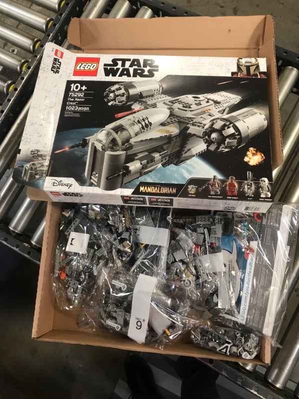 Photo 1 of LEGO Star Wars: The Mandalorian The Razor Crest 75292 Exclusive Building Kit, New 2020 (1,023 Pieces)