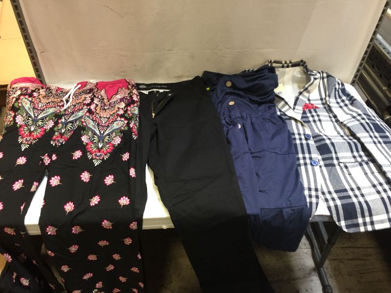 Photo 1 of 4pack ASSORTED CLOTHING sizes range M-XL - SOLD AS IS