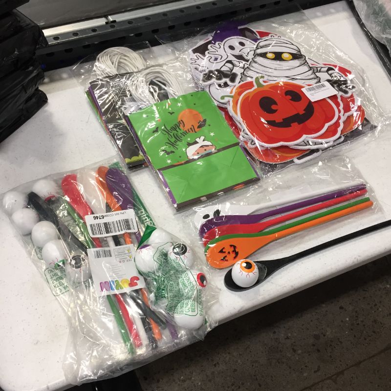 Photo 1 of Halloween bundle, 2 pack gift bags, 2 pack spoon and "egg" game, and yard signs