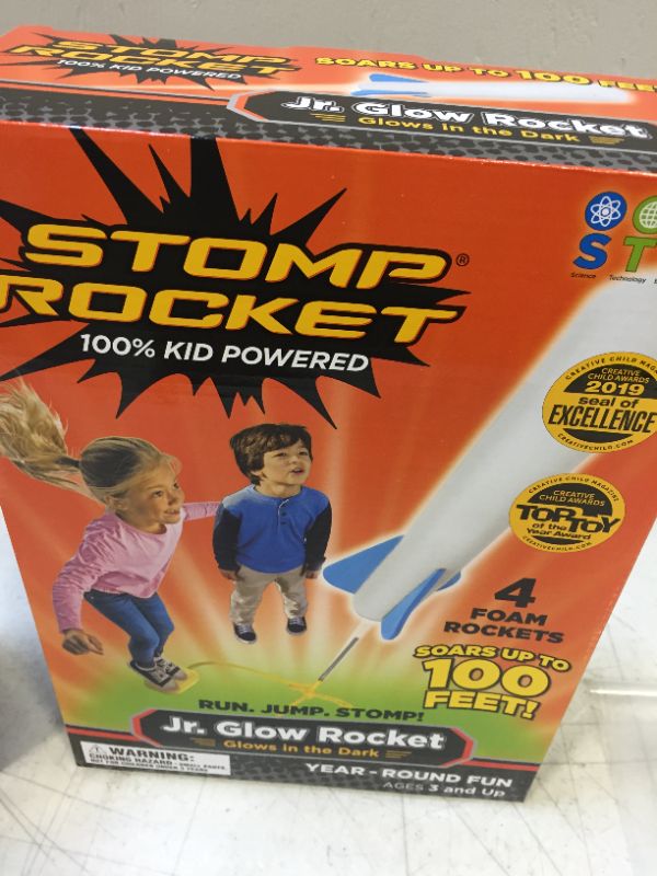 Photo 3 of Stomp Rocket The Original Jr. Glow Rocket Launcher, 4 Foam Rockets and Toy Air Rocket Launcher - Glows in The Dark, STEM Gift for Boys and Girls Ages 3 Years and Up - Great for Year Round Play 2 pack 
